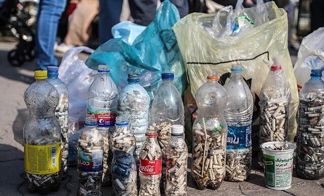 عکس تزئینی است پاکسازی پارک مردم همدان از فیلتر سیگار