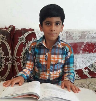 کودک ایلامی برگزیده طرح ملی پویش «با کتاب در خانه» شد