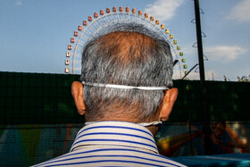 خیابان امامت – 23 شهریورماه ، ساعت 17 – افراد برای ورزش کردن و پیادهروی در پارک از ماسک استفاده میکنند .