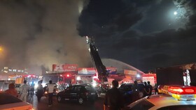 آتش‌سوزی در بازار مصلی مشهد/۱۰۰ آتش‌نشان اعزام شدند 