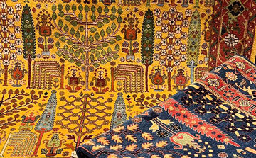 نقش درخت سرو در قالی‌های خراسان نمادی از ایستادگی و باران خواهی