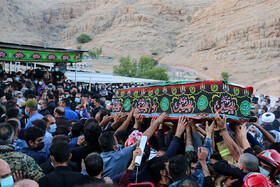 خاکسپاری پیکر "علی لندی" نوجوان فداکار ایذه‌ای