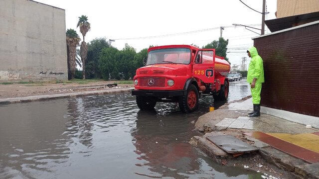 عکس از آتش نشانی اهواز استقرار آتشنشانان در میادین اهواز هنگام بارندگی