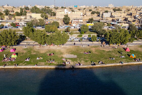 مسافران نوروزی در کنار رودخانه دز-دزفول