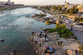مسافران نوروزی در کنار رودخانه دز-دزفول