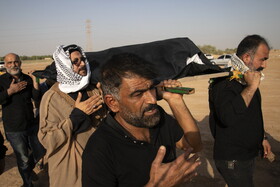 مراسم نمادین خاکسپاری شهدای کربلا - حمیدیه