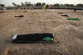 مراسم نمادین خاکسپاری شهدای کربلا - حمیدیه