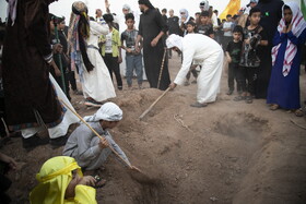 مراسم نمادین خاکسپاری شهدای کربلا - حمیدیه