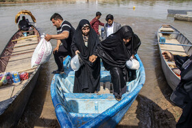 مردم دهستان عنافچه از توابع شهرستان باوی استان خوزستان سالها از پل شناور ارتش برای عبور از رودخانه و تردد به شهر ملاثانی استفاده می کردند. نزدیک به یک ماه است که به دلیل طغیان رودخانه و بالا آمدن آب پل جمع آوری شده و مردم با زحمت فراوان و پذیرفتن خطر برای انجام کارهای روزانه با قایق تردد می کنند.