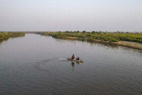 گذر زائران اربعین حسینی از رودخانه دز