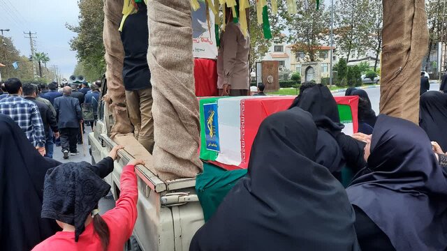 پیکر جانباز ۷۰ درصد آملی در کنار همرزمان شهیدش آرام گرفت