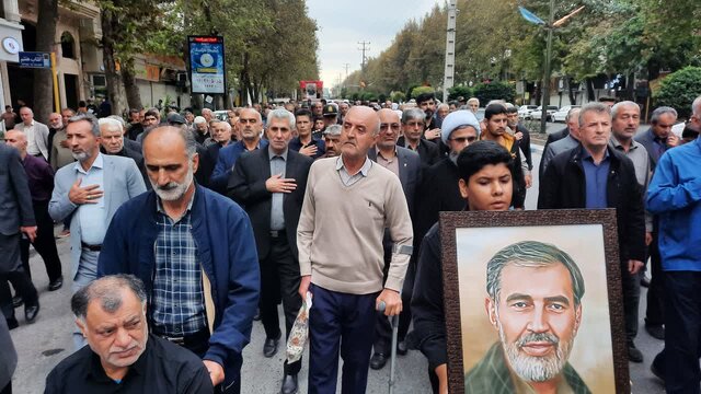 پیکر جانباز ۷۰ درصد آملی در کنار همرزمان شهیدش آرام گرفت