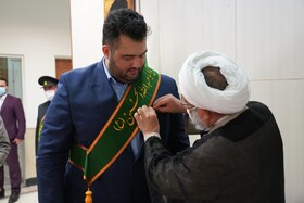 اهدای مدال خادمی مسجد مقدس جمکران به قهرمانان وزنه برداری کشور