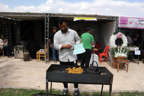 دومین جشنواره طبخ ماهی قزل‌آلا در شهر دندی