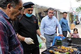 دومین جشنواره طبخ ماهی قزل‌آلا در شهر دندی